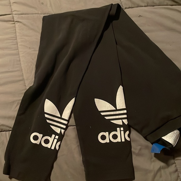 EUC Adidas black leggings w/ white symbol on the bottom of each legs - Picture 2 of 3